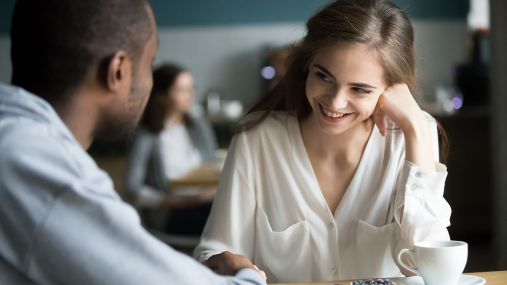 Discover the hidden signs of flirty body language and learn how to read and respond like a pro. Get ready to master the art of nonverbal flirtation!